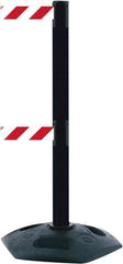 Tensator - 38" High, 2-1/2" Pole Diam, 4 Way Stanchion - 19" Base Diam, Octagon Recycled Rubber Base, Black Plastic Post, 7-1/2' x 2" Tape, Dual Line Tape, For Outdoor Use - Top Tool & Supply