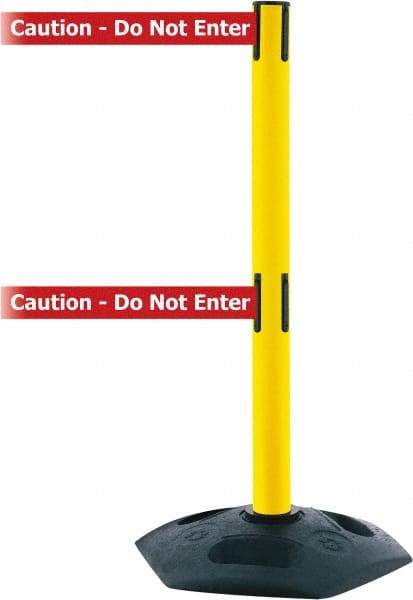 Tensator - 38" High, 2-1/2" Pole Diam, 4 Way Stanchion - 19" Base Diam, Octagon Recycled Rubber Base, Yellow Plastic Post, 7-1/2' x 2" Tape, Dual Line Tape, For Outdoor Use - Top Tool & Supply