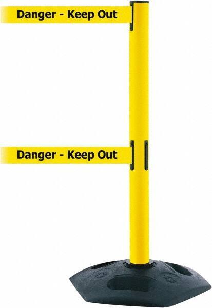 Tensator - 38" High, 2-1/2" Pole Diam, 4 Way Stanchion - 19" Base Diam, Octagon Recycled Rubber Base, Yellow Plastic Post, 7-1/2' x 2" Tape, Dual Line Tape, For Outdoor Use - Top Tool & Supply