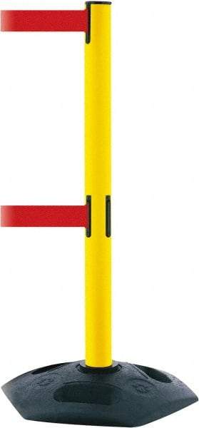 Tensator - 38" High, 2-1/2" Pole Diam, 4 Way Stanchion - 19" Base Diam, Octagon Recycled Rubber Base, Yellow Plastic Post, 7-1/2' x 2" Tape, Dual Line Tape, For Outdoor Use - Top Tool & Supply