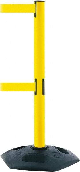 Tensator - 38" High, 2-1/2" Pole Diam, 4 Way Stanchion - 19" Base Diam, Octagon Recycled Rubber Base, Yellow Plastic Post, 7-1/2' x 2" Tape, Dual Line Tape, For Outdoor Use - Top Tool & Supply