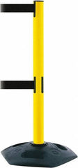 Tensator - 38" High, 2-1/2" Pole Diam, 4 Way Stanchion - 19" Base Diam, Octagon Recycled Rubber Base, Yellow Plastic Post, 13' x 2" Tape, Dual Line Tape, For Outdoor Use - Top Tool & Supply