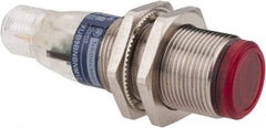 Telemecanique Sensors - 4 Pin M12 Connector, 2m Nominal Distance, Shock and Vibration Resistant, Polarized Retroreflective Photoelectric Sensor - 12 to 24 VDC, 500 Hz, Nickel Plated Brass, 2.44 Inch Long x 0.71 Inch Wide - Top Tool & Supply