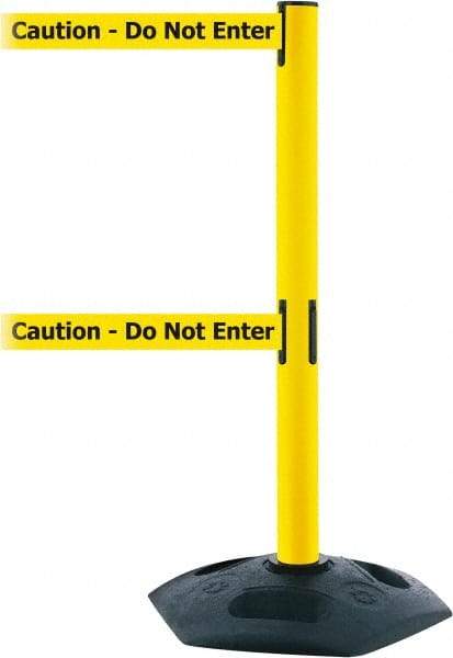 Tensator - 38" High, 2-1/2" Pole Diam, 4 Way Stanchion - 19" Base Diam, Octagon Recycled Rubber Base, Yellow Plastic Post, 7-1/2' x 2" Tape, Dual Line Tape, For Outdoor Use - Top Tool & Supply